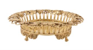 A George IV silver gilt circular dessert basket by William Eley & William Fearn