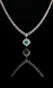 A diamond and emerald necklace