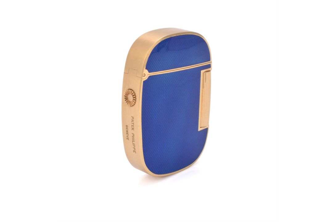 Patek Philippe, Ellipse, a gold coloured and enamel gas lighter - Image 2 of 3