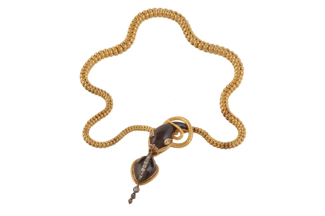 A mid Victorian gold, diamond and garnet serpent necklace - Image 1 of 2