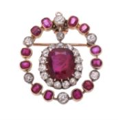A late Victorian and later ruby and diamond brooch/pendant