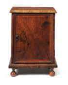 A Queen Anne figured walnut collector's cabinet