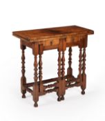 A William & Mary walnut folding writing table