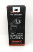 A boxed as new Neewer NW-565 TTL off machine flash for Canon (Box opened).