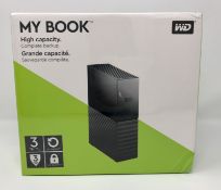 A boxed as new Western Digital My Book 3TB Desktop Hard Drive (Box sealed).