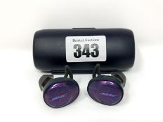 A pre-owned pair of Bose SoundSport Free wireless ear-buds in Ultraviolet with charging case.