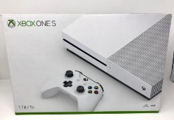 A boxed as new Microsoft Xbox One S 1681 1TB Console (Box opened).