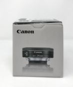 A boxed as new Canon EF-S 24 mm f/2.8 STM Lens.