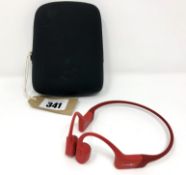 A pair of pre-owned AfterShokz Aeropex Bone Conduction Open Ear Wireless Headphones in Red with