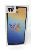 A boxed as new Huawei Y6 (2019) MRD-LX1 32GB in Sapphire Blue (IMEI: 864117044996616) (Box opened).