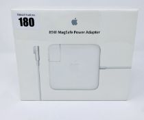 A boxed as new Apple 85W MagSafe Power Adapter for MacBook Pro (MC556B/C) (Box sealed).