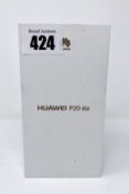 A boxed as new Huawei P20 lite ANE-LX2 64GB Dual SIM Smartphone in Sakura Pink (IMEI: