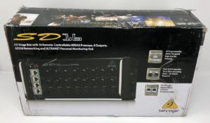 A boxed as new Behringer SD16 I/O Digital Stage Box with 16 pre-amps and 8 outputs (Box opened, some