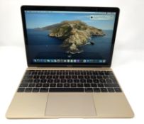 A pre-owned Apple MacBook 12