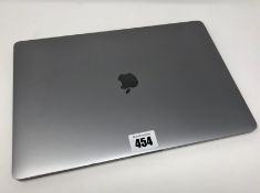 A pre-owned MacBook Pro 15