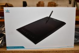 A boxed as new Huion Graphics Drawing Pen Tablet H610 Pro. 8192 Levels of Pressure Sensitivity. 10 x