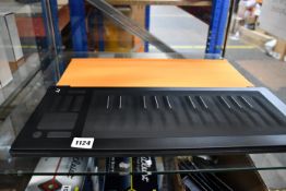 A pre-owned Roli Seaboard Rise 25 and Roli case (Requires power cable).