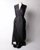 One Givenchy Black Peplum Double Breasted Sleeveless Coat in tuxedo tailoring and one pair of