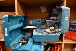 Two pre-owned Makita tools to include an angle grinder and a reciprocating saw.