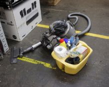A pre-owned Dyson Root Cyclone vacuum and a small quantity of cleaning products.