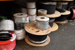 A large quantity of miscellaneous reeled wires and related items.