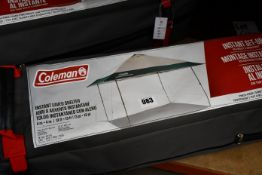 An as new Coleman instant canopy sun shade (13ft x 13ft).