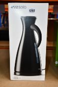 Two boxed as new Eva Solo designer electric kettles in black (Require a UK adaptor).