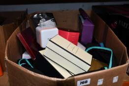 A box of as new/pre-owned perfumes and makeup to include Revolution, Rituals and Jo Malone.