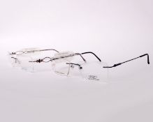 Two pairs of as new Airlight glasses frames with clear glass (RRP £180 each).