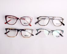 Four pairs of as new Wolf glasses frames with clear glass (RRP £140 each).