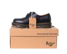 One pair of boxed as new Dr. Martens 1461 black leather shoes (UK 5).