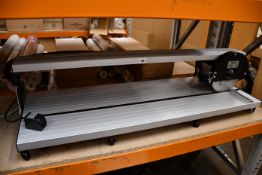 An as new Eberth 900mm table top tile cutter.