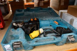 A pre-owned Makita 8406C diamond core and hammer drill.