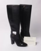 A pair of as new Ralph Lauren Annesley boots (UK 5- RRP £150).