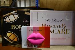 A boxed as new Two Faced Born This Way eyeshadow and face highlighters to enhance all skin, a Two