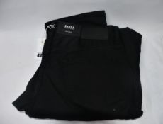 A pair of as new Hugo Boss Maine jeans (W34/L34).