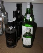 Two Grosvenor Dry gin (700ml), a Gordan's Special Dry gin (750ml), a Gordan's Special Dry gin (187.