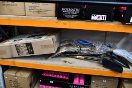 Eight as new garden spades together with a galvanised wheelbarrow.