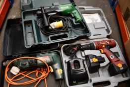 A pre-owned Bosch CSB 700-2RLE hammer drill, a pre-owned Perles AG drill with battery and charger