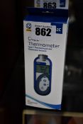 One boxed a new Comark C42C food thermometer.
