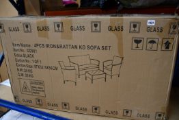One boxed as new four piece iron and rattan sofa set (GD901).