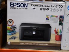 A boxed as new Epson Expression Home XP-3100 Print/Scan/Copy Wi-Fi Printer in Black.