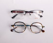 Two pairs of as new Dutz glasses frames with clear glass (RRP £190 each).