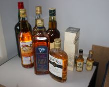 An Isle of Skye Scotch whisky (700ml), a McAndrews Blended Scotch whisky (700ml), a Sainsbury's