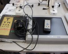 A Sussex electronic sight chart together with a Luneau Charts Display L40 with remote.