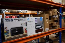 A quantity of assorted printer ink cartridges and printer parts.