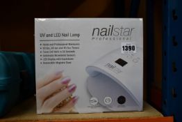 Five boxed as new Nailstar Professional UV and LED nail lamps.