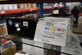 One HP LaserJet 201x tri-pack high volume print cartridges (Cyan, yellow and magenta).
