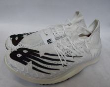 A pair of as new New Balance Fuel Cell 5280 trainers (UK 10 - No box).