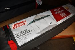 An as new Coleman instant canopy sun shade (13ft x 13ft).